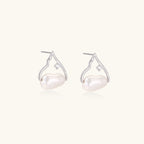 Silver mountain outline studs with baroque pearl and diamond accent on white background