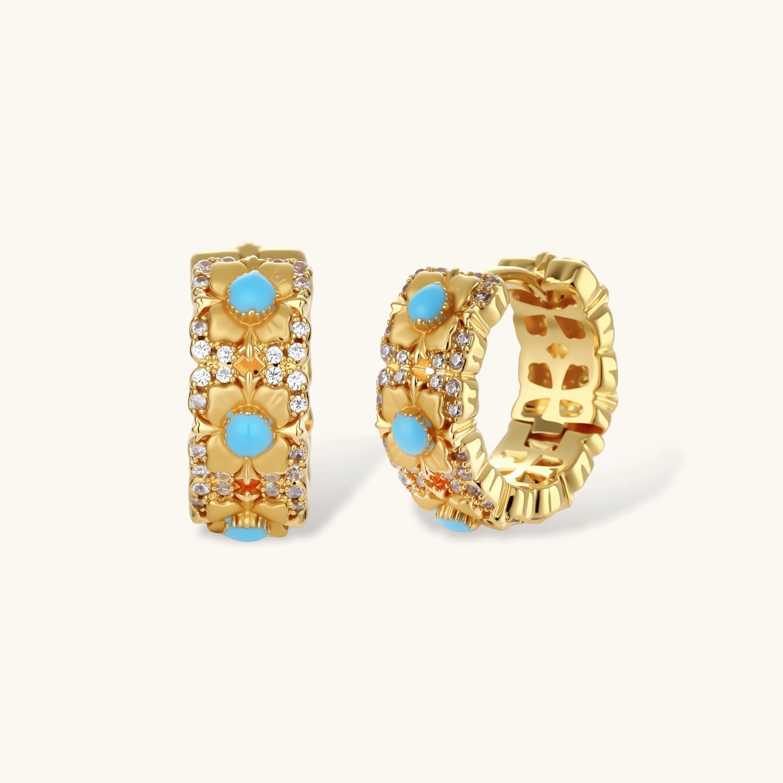 18K gold-plated hoop earrings with turquoise-centered flowers and crystal details on white background.
