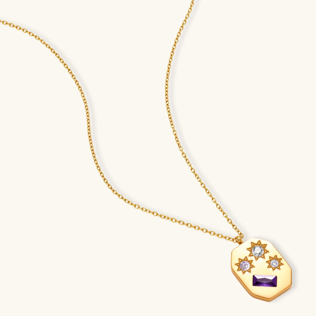 Gold-plated octagonal pendant necklace with engraved star motifs, purple baguette CZ, lavender and clear round stones on chain.