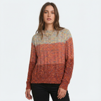 Woman wearing a patterned sweater on a white background