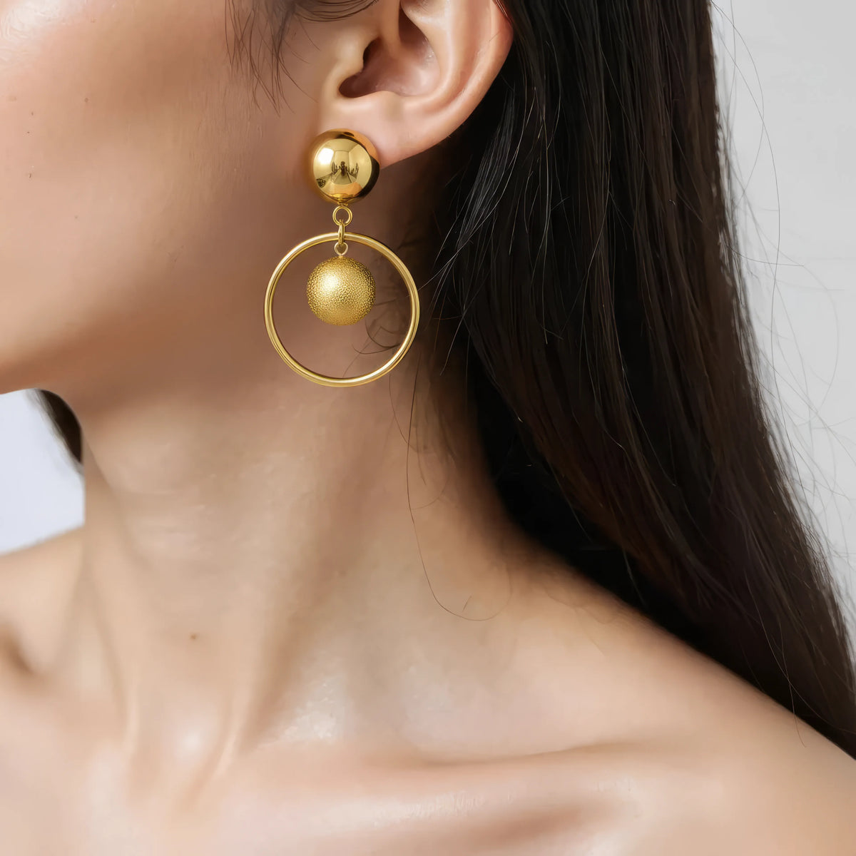AW Peachy stud meets the hoop Earrings